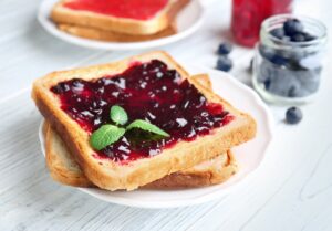 Delicious,Toast,With,Sweet,Jam,On,Plate
